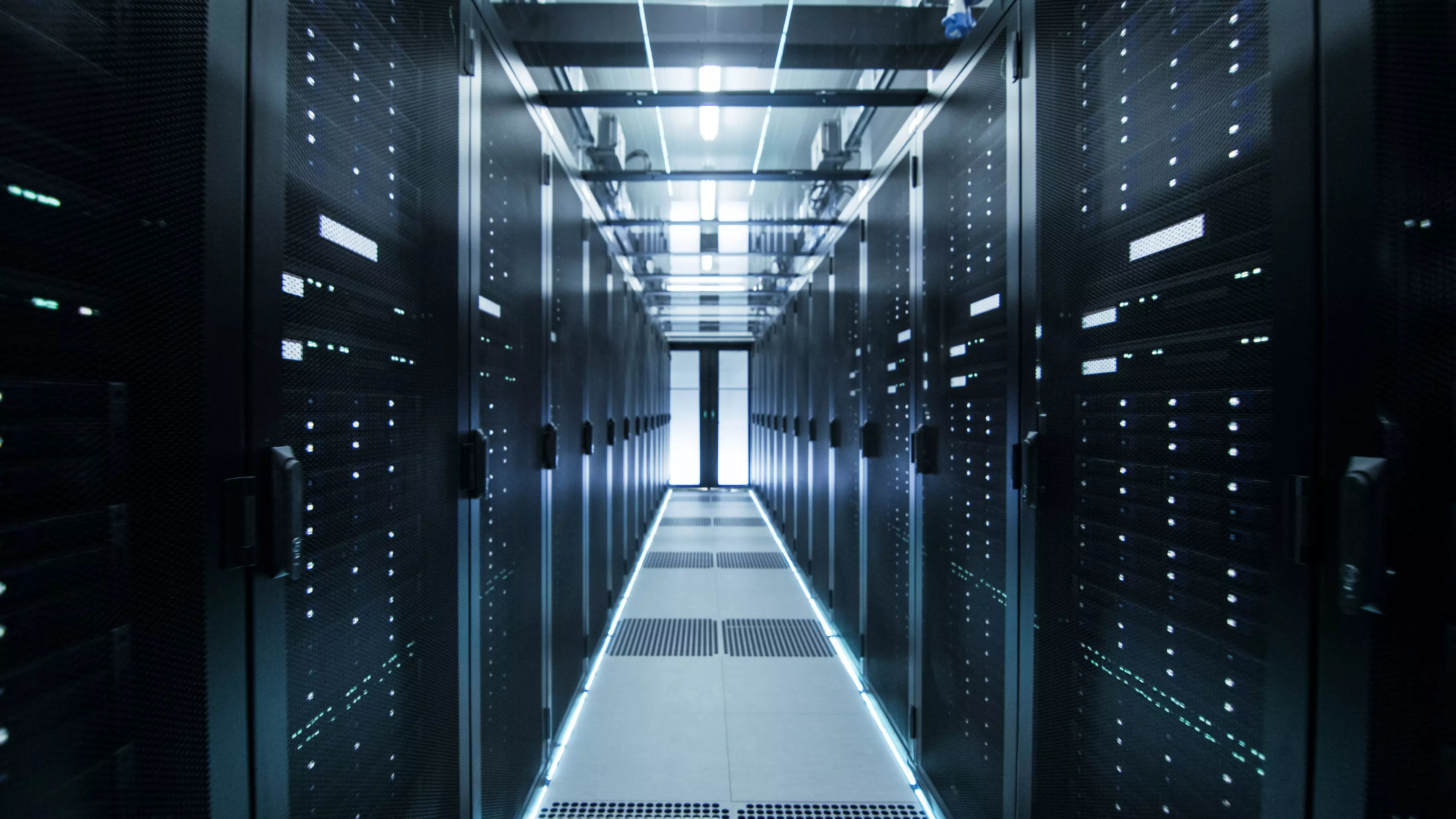  A hallway with servers on both sides.