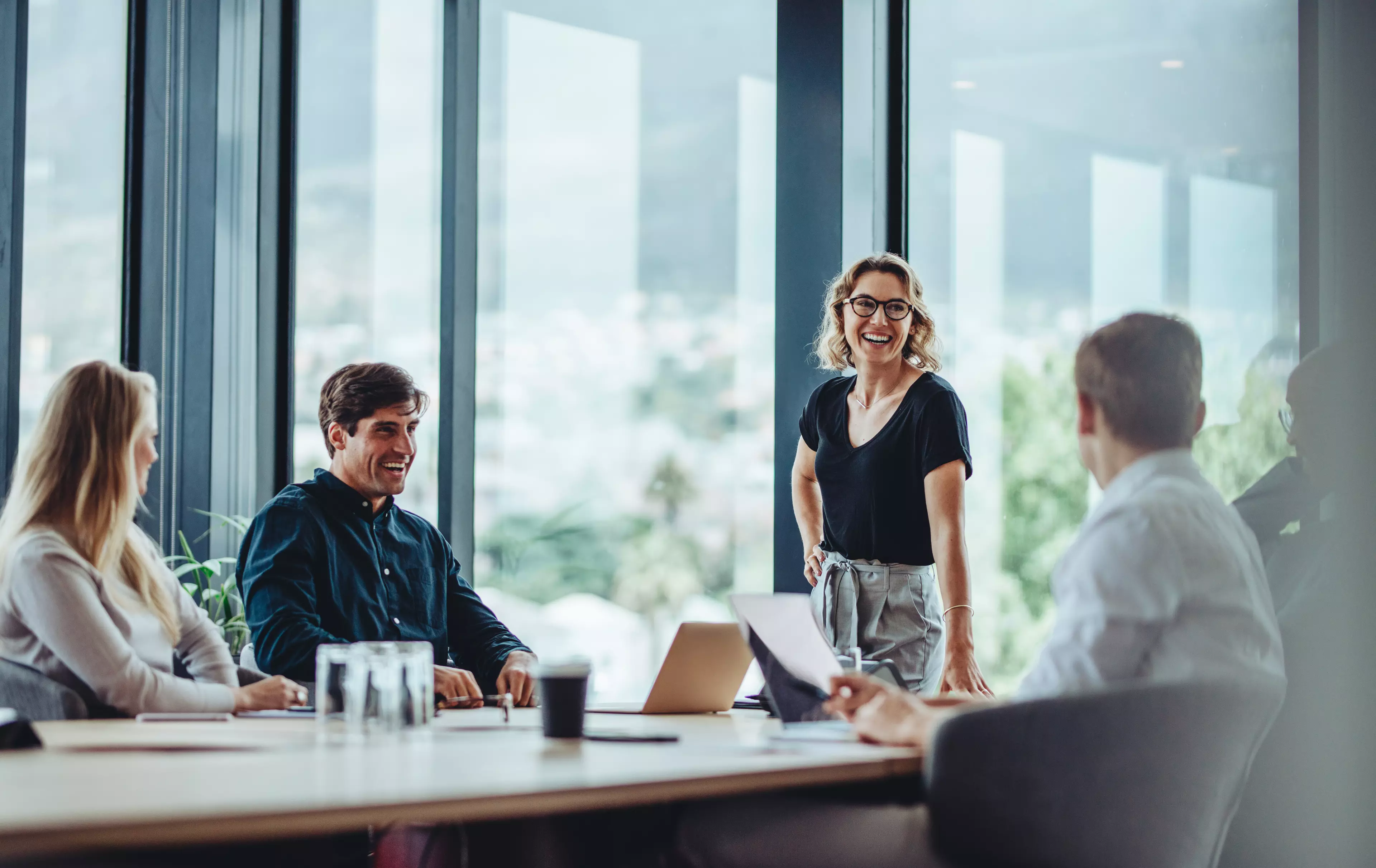 Smiling employees during a meeting in the office